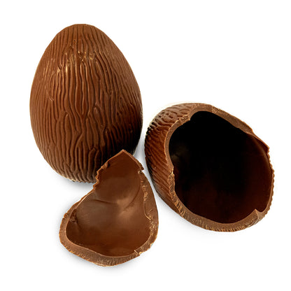 maxi milk chocolate Easter egg, no wrapper broken to show hollow inside